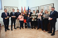 López Miras, junto con miembros de Assido