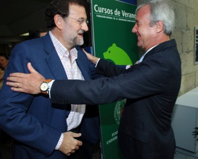 Ramón Luis Valcarcel junto con Mariano Rajoy durante clausura del curso de verano de la Universidad Complutense de Madrid